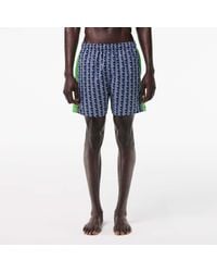 Lacoste - Mid Length Monogram Print Swim Trunks - Lyst