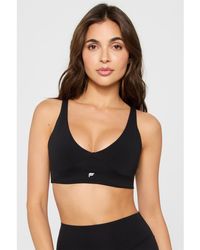 Fabletics - Pureluxe Low-Impact Sports Bra - Lyst