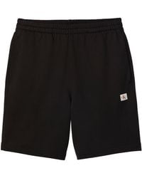Calvin Klein - Woven Badge Fleece Jogger Shorts - Lyst