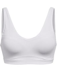 Under Armour - Smartform Evolution Mid Medium Impact Sports Bra - Lyst
