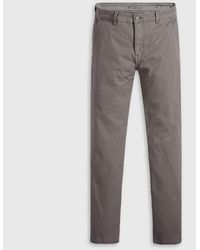 Levi's - Levi's Solid Patterned Slim Chinos With Slant Pockets - Lyst
