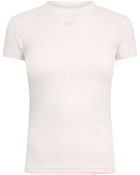The Couture Club - Sculpting Stretch Emblem Baby T-Shirt - Lyst