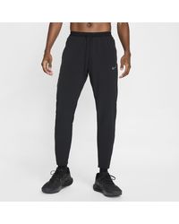 Nike - Stride Dri-Fit Woven Running Trousers - Lyst