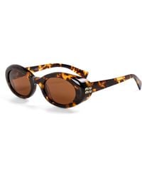 Miu Miu - Sun 0Mu B09S Ld63 Oval Sunglasses - Lyst
