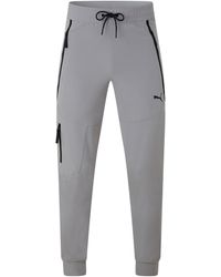 PUMA - Tech Closed Hem Woven Jogger - Lyst
