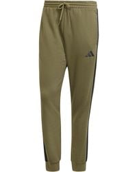 adidas - Essentials Fleece Tapered Cuff 3-Stripes Joggers - Lyst