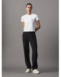 Calvin Klein - Script Institutional Baby Tee - Lyst