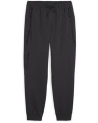 PUMA - Tech Closed Hem Woven Jogger - Lyst