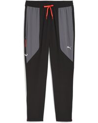 PUMA - Flex Closed Hem Woven Joggers - Lyst