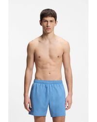 HUGO - Swim Shorts With All-Over Stacked Logos - Lyst