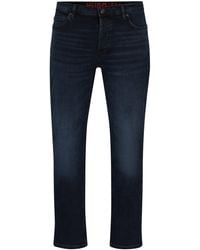 HUGO - Jean Tapered Fit en denim bleu-noir - Lyst
