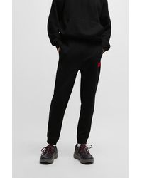 HUGO - Cotton-terry Tracksuit Bottoms With Red Logo Label - Lyst