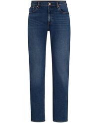 HUGO - Slim-Fit Stone-washed Jeans aus marineblauem Stretch-Denim - Lyst