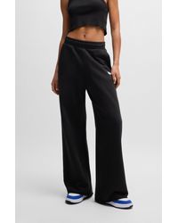 HUGO - Relaxed-fit Tracksuit Bottoms With Logo Print - Lyst