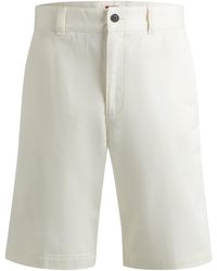 HUGO - Regular-Fit Shorts mit schmalem Beinverlauf und geknöpften Taschen - Lyst