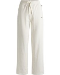 BOSS - Pyjama-Hose aus Stretch-Baumwolle mit Tunnelzug und Logo-Print - Lyst
