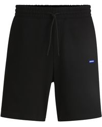 HUGO - Short Van Katoenen Sweatstof Met Trekkoord En Blauw Logolabel - Lyst