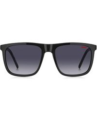 HUGO - Sonnenbrille aus schwarzem Acetat mit gemusterten Bügeln - Lyst
