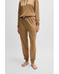 BOSS - Cuffed Tracksuit Bottoms With Signature-Stripe Drawcord - Lyst