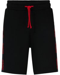 HUGO - Shorts aus Baumwoll-Terry mit Logo-Stickereien und Tunnelzugbund - Lyst