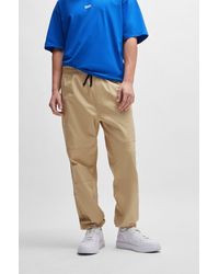 HUGO - Tapered-fit Trousers In Structured Cotton - Lyst