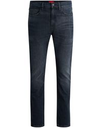 HUGO - Slim-Fit Jeans aus Stretch-Denim mit Akzenten im Used-Look - Lyst