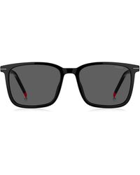 BOSS by HUGO BOSS - Sonnenbrille aus schwarzem Acetat mit roten Details - Lyst