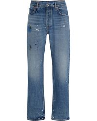 HUGO - Regular-Fit Jeans aus mittelblauem Denim mit Splash-Details - Lyst