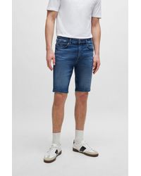 BOSS - Slim-fit Shorts In Blue Soft-motion Denim - Lyst