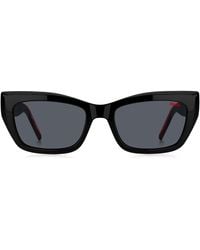 HUGO - Zonnebril Van Zwart Acetaat Met Gelaagde Pootjes In Kenmerkend Rood - Lyst