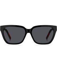 HUGO - Lunettes de soleil en acétate noir avec branches logotées - Lyst