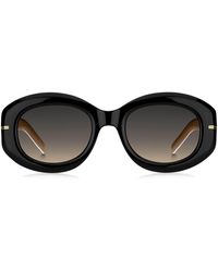 BOSS - Sonnenbrille aus schwarzem Acetat mit Kettchen - Lyst