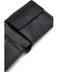 BOSS - Portefeuille à deux volets en cuir avec logos emés et poche pour la monnaie - Lyst