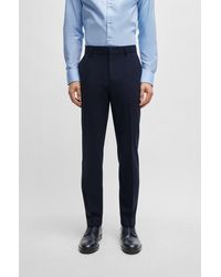 BOSS - Pantalon Regular Fit en laine vierge stretch - Lyst