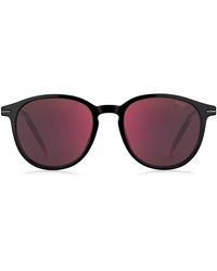 BOSS by HUGO BOSS - Runde Sonnenbrille aus schwarzem Acetat mit roten Details - Lyst