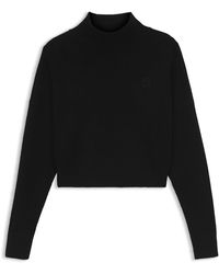 HUGO - Kurzer Rollkragenpullover Mit Happy Logo-Stickerei - Lyst