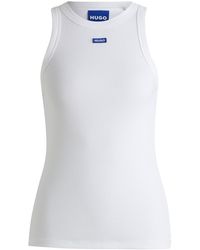 HUGO - Slim-Fit Top Van Stretchkatoen Met Blauwe Logopatch - Lyst