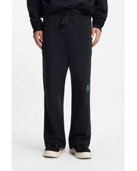 HUGO - Cotton-Terry Tracksuit Bottoms With Logo Print - Lyst