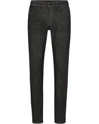 BOSS - Slim-Fit Jeans aus schwarzem Performance-Stretch-Denim - Lyst