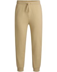 HUGO - Jogginghose Aus Baumwoll-Terry Mit Logo-Print - Lyst