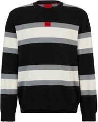 HUGO - Sweatshirt aus Baumwolle mit Blockstreifen und rotem Logo-Etikett - Lyst