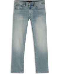 BOSS - Slim-Fit Jeans Van Blauwe Stretchdenim Uit De By Beckham-Collectie - Lyst