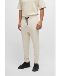 BOSS - Regular-fit Tracksuit Bottoms With Double-monogram Badge - Lyst