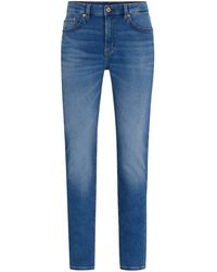 HUGO - Blaue Slim-Fit Jeans aus Stretch-Denim mit Stone-washed-Finish - Lyst