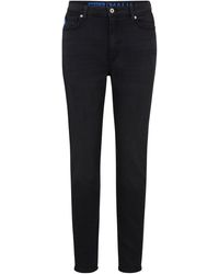 HUGO - Skinny-Fit Jeans aus schwarzem Stretch-Denim - Lyst