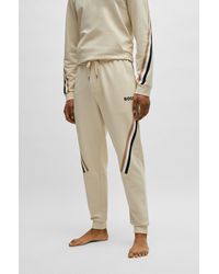 BOSS - Cotton-terry Tracksuit Bottoms With Signature-stripe Tape - Lyst