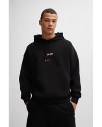 HUGO - Cotton-terry Oversized-fit Hoodie With Seasonal Logos - Lyst