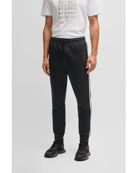 BOSS - Relaxed-Fit Tracksuit Bottoms With Jacquard-Woven Circles - Lyst