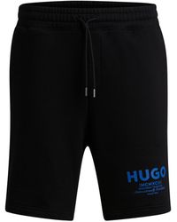 HUGO - Shorts aus Baumwoll-Terry mit Logos der neuen Saison - Lyst