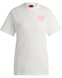 HUGO - Relaxed-Fit T-Shirt aus Baumwoll-Jersey mit Strass-Artwork - Lyst